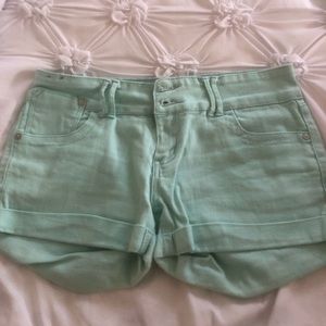 Adult sized teal jeans size 7